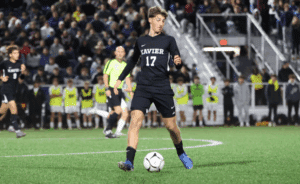 Xavier winger Corbin Englemen looks to make a play last season. (Marina Canellas)