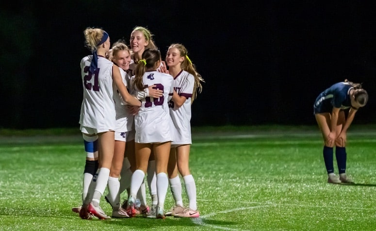 Belmont celebrates Catherine Greiner's go-ahead goal versus Lexington. (Patrick Donnelly/NESJ)