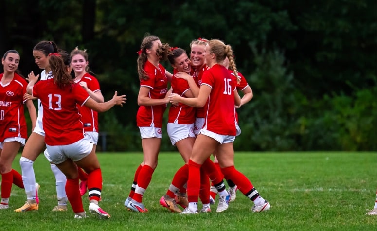 Masconomet celebrates in its win over Winchester on Thursday. (Patrick Donnelly/NESJ)