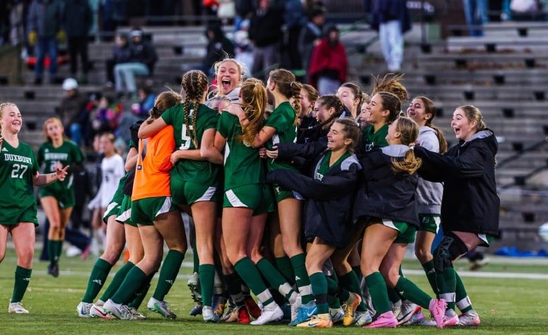 Duxbury celebrates winning the MIAA girls Division 2 state title. (Brian Kelly/NESJ)